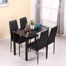 13 leather dining room chairs that add sophistication to your table. Pananahome Modern Glass Dining Table Set With 4 Faux Leather Chairs Padded Chairs Dining Room Kitchen Black Buy Online In Azerbaijan At Azerbaijan Desertcart Com Productid 134766651