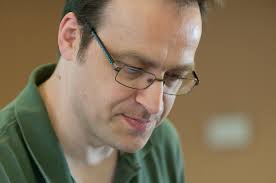 Krste Asanović looking down (closeup)