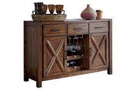 During dinner parties or holidays, you can place hors d'oeuvres, mains, sides and drinks onto a server so your dinner table is free from clutter. Buffet Dining Room Server Dining Room Sideboard Rustic Dining Room