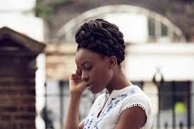 A lovely side braid is wrapped around a bun. 56 Best Natural Hairstyles And Haircuts For Black Women In 2020