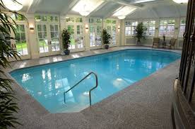 These indoor swimming pool designs are going to blow your mind. The Master Pools Guild Presents 20 Fabulous Residential Indoor Pools Indoor Outdoor Pool Small Indoor Pool Indoor Pool Design