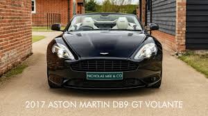 Image result for Marron Black 2017 Aston Martin