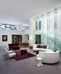 Enthralling Glass Staircases That Add Sculptural Style To Your Home Glass Staircase Living Room Modern Contemporary Living Room