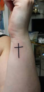 Black cross wrist tattoos for couple. Pin On Tattoos