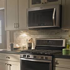 Microwave above stove traditional kitchen also beadboard cabinets bianco sardo granite dark wood beam exposed wood beams glass ceiling light red oak flooring wood bar stools kitchen. Range Hoods Buying Guide At Menards