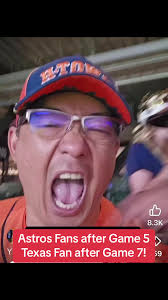 Fan Wearing Astros Jersey at Rangers Parade