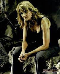 Battlestar Galactica Lucy Lawless as D'Anna Biers Seated 8 x 10 Inch Photo  LTD17 at Amazon's Entertainment Collectibles Store