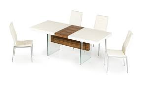 We offer large table and chair sets that are a perfect fit for formal dining rooms and conference rooms. Sovrin Extendable Dining Table In 2021 Extendable Dining Table Dining Table Modern Dining
