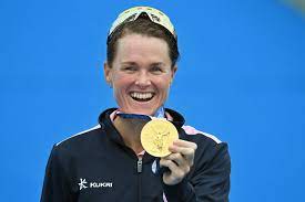 Flora duffy of bermuda holds her gold medal during a medal ceremony for the women's individual triathlon competition (courtesy: 3ktb39reo33nnm