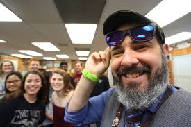 Colorblind since birth, a beloved teacher gets a gift from his students.  Now 'everything pops.'