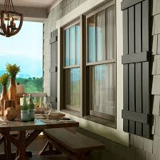 Ply Gem 14 In X 71 In Polypropylene Plastic Arch Top Closed Board And Batten Shutters Pair In Blue Bbarch71 41 The Home Depot In 2020 Board And Batten Shutters Shutters Exterior House Shutters