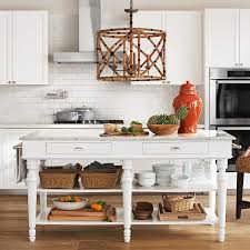 At minimum, an island should be 4 feet long and a little more than 2 feet deep, but it must also have room for people to the height of your island's eating area dictates the type of seating you'll have: Larkspur Marble Top Kitchen Island Williams Sonoma