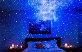 Features star projector & led nebula cloud ocean wave projector: This Best Selling Amazon Night Light Transforms Your Bedroom Into A Starry Night Sky Southern Living