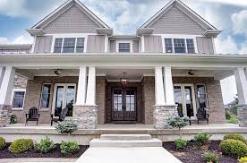 Traditional Exterior Of Home With Exterior Stone Floors Pathway Exterior Brick Floors Wrap Around P Traditional Home Exteriors Exterior Brick House Exterior