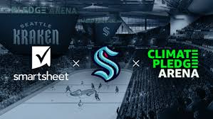 An iconic roof standing nobly against the olympic mountains, yet beneath awaits danger…the subterranean lair of the seattle kraken. Smartsheet Kraken Climate Pledge Arena Smartsheet