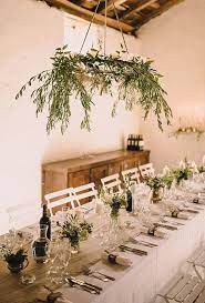 Brides Greenery Chandelier Of Olive Branches Wispy Olive Branches Help Create An Elegant Hanging Wedding Decorations Greenery Wedding Decor Wedding Branches