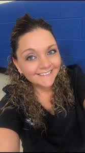 Can someone fix my hair for a work website photo?