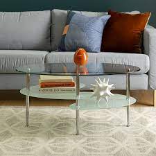 Made of dark brown acacia wood with a contrasting cream coloured storage drawer. Walker Edison Mid Century Modern Oval Glass Coffee Table From Walker Edison Accuweather Shop