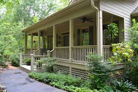 Formal living and dining rooms sit to the right, full of elegance with bay windows, a. Rustic Ranch With Lower Level Expansion 29863rl Architectural Designs House Plans