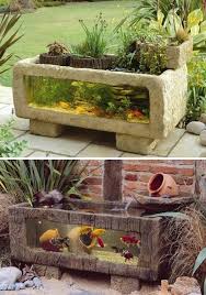 Create a box out of scrap wood, use a large plant pot, or even make an aquatic ecosystem out of an old canoe. 21 Small Garden Backyard Aquariums Ideas That Will Beautify Your Green World Outdoor Fish Ponds Ponds Backyard Small Gardens