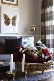 This makes it easy for me to quickly remove the decor if the coffee table is needed for a board game or snacks. Oscar Bravo Home What S On My Coffee Table Gothic Style Halloween Centerpiece Classy Halloween Decor Halloween Centerpiece Stylish Halloween Decor