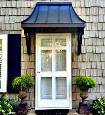 I Like The Shape Of This Awning I Would Like The Braces On The Side To Be Solid Metal And Not Attached Down On The House Awnings Door Awnings Awning Over