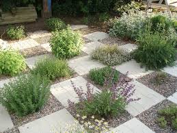 Herb Garden Planted Checkerboard Paving Stones Xeriscaping Idea Extra Heat From Stones Little Evaporation Of Water Gardening Garden Paving Garden Pla