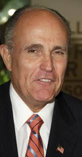 Rudy giuliani is in some major hot water after a scene in 'borat 2' shows him sticking his hand down his pants and lying on a bed while trying to seduce an actress playing sacha baron cohen. Rudy Giuliani Imdb