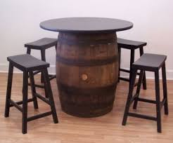 Jack daniels bar stool made by hand from maple worms, it is equipped with a low gloss varnish and dark finish. White Oak Whiskey Barrel Table 36 Table Top 4 Black Bar Stools Buy Online In Botswana At Botswana Desertcart Com Productid 106299497