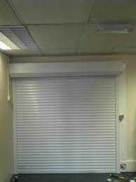 Rsg5100 Continental Security Roller Shutter Fitted To A Store Room Of A Commercial Centre In Walthamstow Roller Shutters Shutters Garage Doors