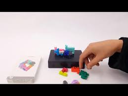 Paw your way through all 48 puzzles and you're the top dog! Dog Pile The Pup Packing Puzzle