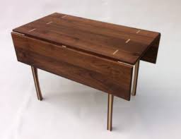 Plus, thanks to its metal base and wood tabletop, it'll work in rustic, industrial. Walnut Drop Leaf Dining Table