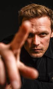 When Sam Heughan looks at you like this, it's impossible to look away. It  almost feels like he's about to grab your heart too.