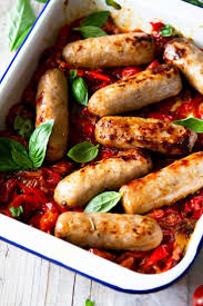 Italian Sausage Bake A Delicious And Easy One Pan Dinner Made With Italian Sausages Tomatoes And Peppers Easy A Italian Sausage Sausage Bake Italian Recipes