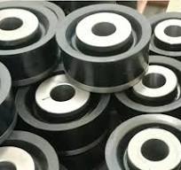 Pistons of mud pumps: materials and applications