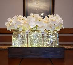 Mason Jar Centerpiece With Lights Farmhouse Table Decor Etsy In 2020 Mason Jar Centerpieces Mason Jar Decorations Jar Centerpieces
