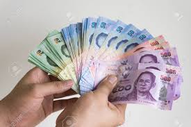 Type in the amount you want to convert and press the convert button. Thai Baht Money In Hand Stock Photo Picture And Royalty Free Image Image 81099223