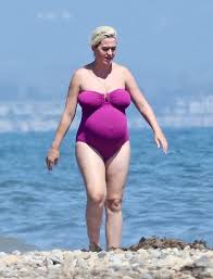 Best baby boy swimsuit : Katy Perry Models Baby Bump In Purple Swimsuit In New Beach Photos Hollywood Life