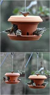 27 decorative terra cotta crafts to beautify your outdoor spaces bird feeders homemade bird houses bird houses diy