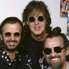 The Beatles members Ringo, Paul, and George in a historical photo