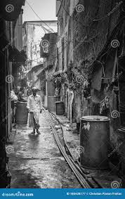 Black and White Photo of an Alley in the Asian Slum Called Dharavi, in  Mumbai, India. Editorial Photography 