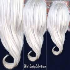 She starts off as a platinum blonde when she is a child. White Icy Blonde Hair Color Elsa Frozen Hair Style Frozen Hair Elsa Frozen Hair Icy Blonde Hair