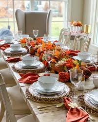 This round dining table features a natural finish on the solid veneer top and curved solid wood legs, for a charming farmhouse look. Beautiful Harvest Tablescape Martha Stewart Fall Tablescape