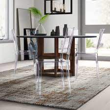 The armless acrylic chair also features wheel casters for easy mobility, allowing you to move the chair from room to room effortlessly. Clear Lucite Dining Chairs Wayfair