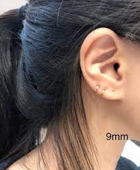 tiny flat huggie hoop earring single or pair flat gold hoop etsy ear piercings chart ear piercings gold ear climbers