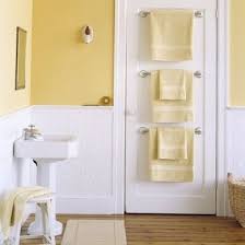 15 Ways To Make A Small Bathroom Big Small Bathroom Small Bathroom Storage Yellow Bathrooms