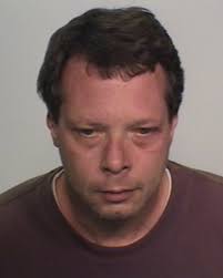 Man Charged with Assaulting Roommate with Sword