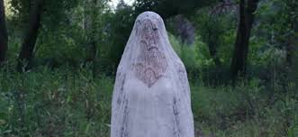 Several teenage girls at a purity retreat participate in a secret ritual, and they start to see a supernatural entity. Movie Review Into The Dark S Pure Nightmarish Conjurings