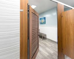 Ironwood Manufacturing Compact Laminate Phenolic Toilet Partitions And Louver Bathroom Doors Clean Traditional Cus Public Bathrooms Bathroom Doors Ironwood