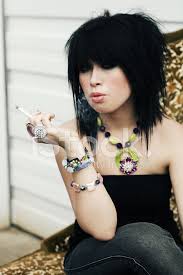 Black haired woman with voluminous, shiny and curly hairstyle.frizzy hair. Black Haired Young Woman Smoking Stock Photos Freeimages Com